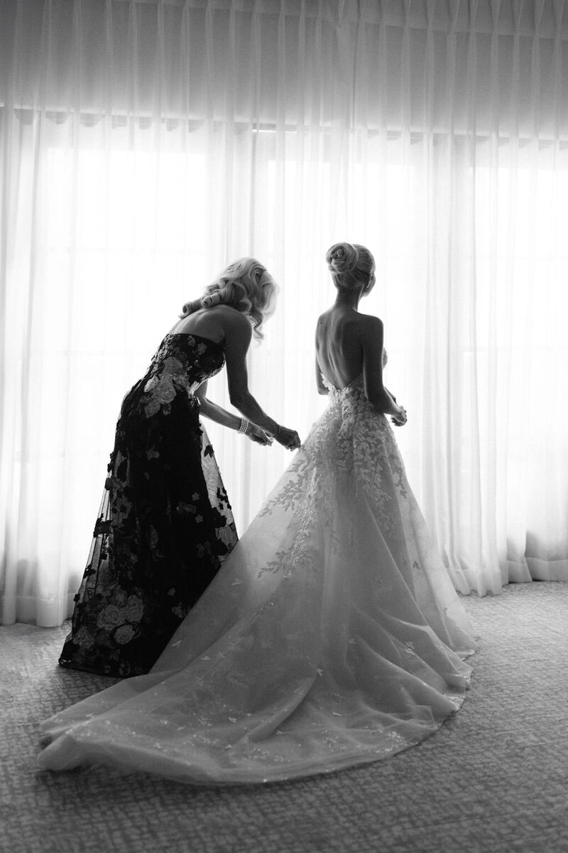 Ojai Valley Inn wedding - bride in bridal gown - ojai wedding - wedding photography - bride getting dressed - luxury destination wedding