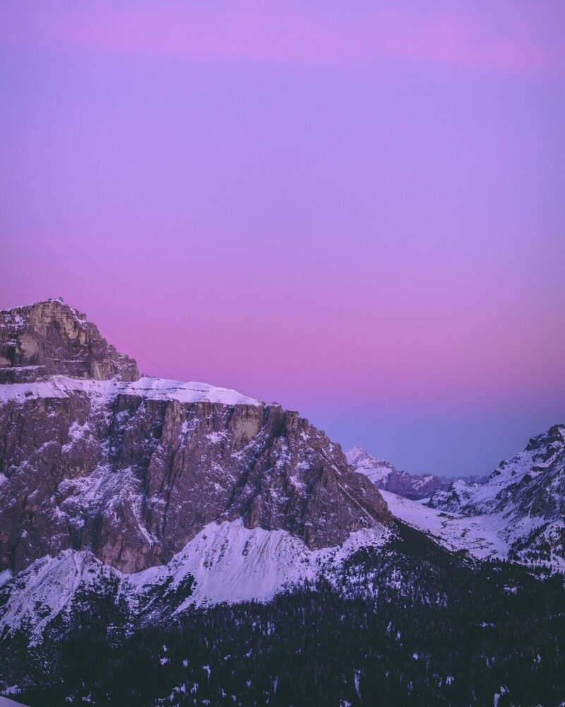 mountains with a purple sunset