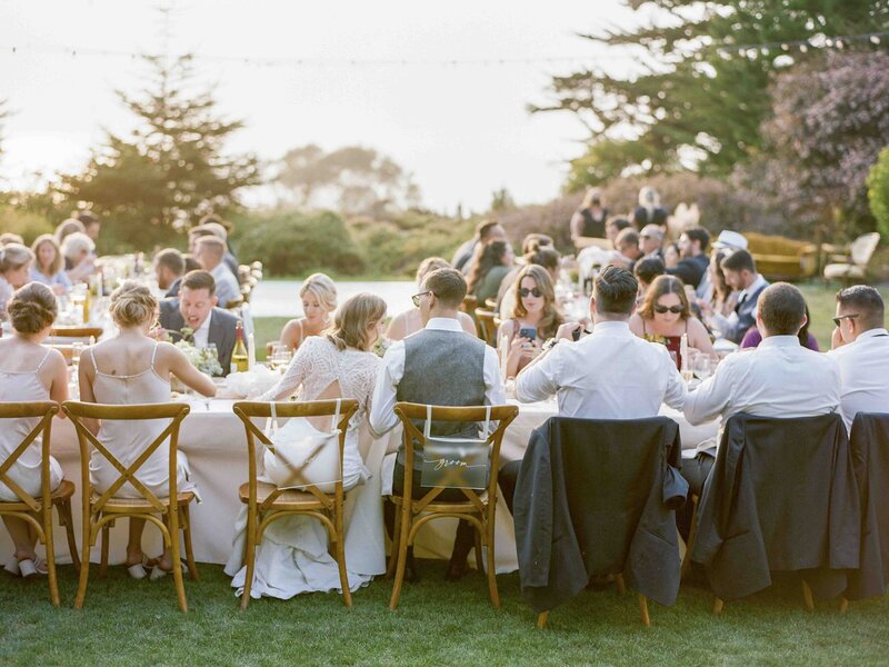 bridal party eating at reception