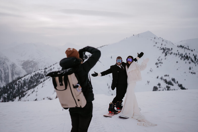 Banff adventure photographer photographing a couple on their skiing elopement