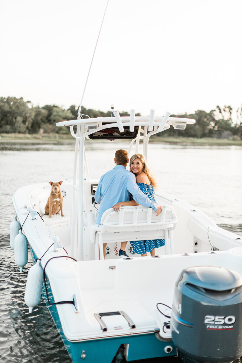 Boating Photo with their dog in this Engagement Photo in Beaufort NC.