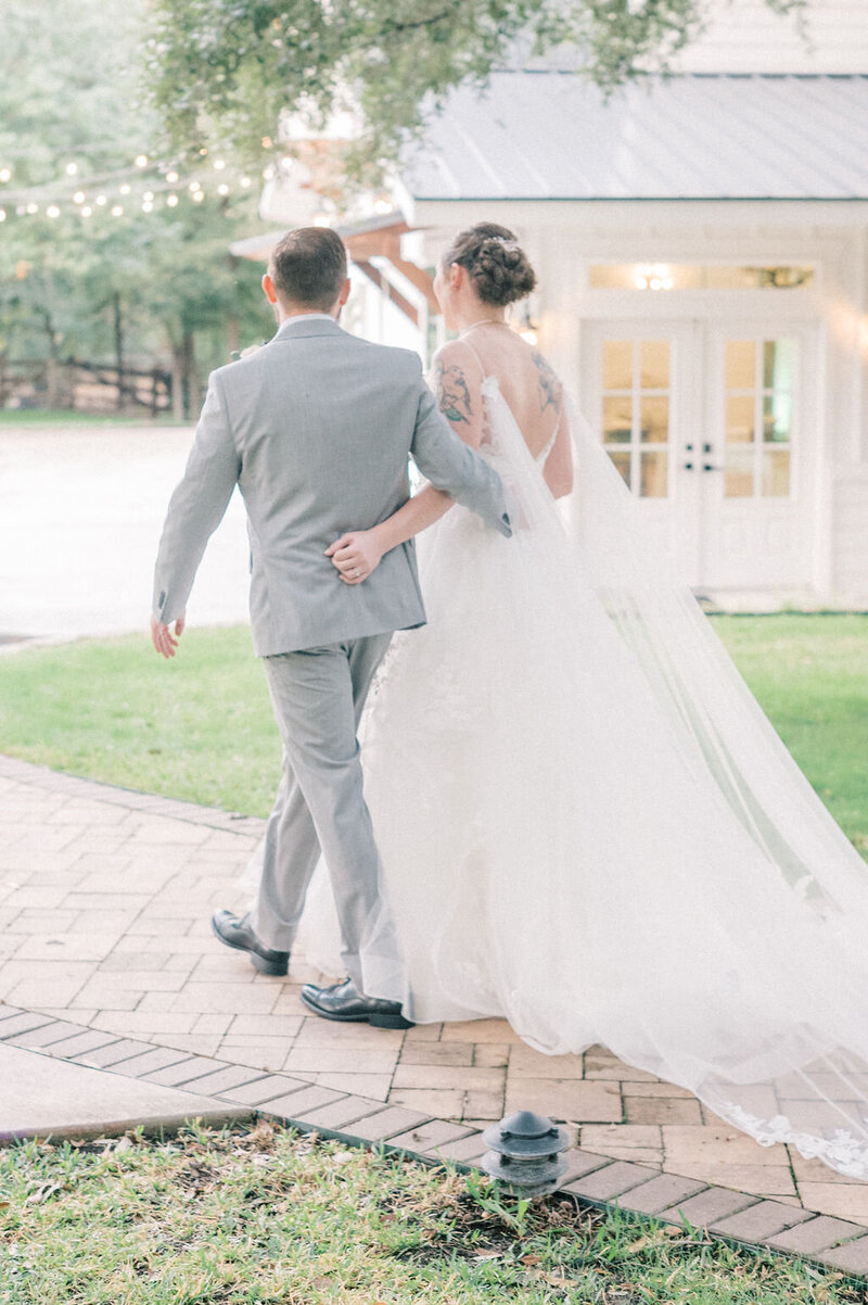 Fort Worth Wedding Photographer | DFW Photographer Rae De Lain Weddings Light and Airy | Bride and groom walking