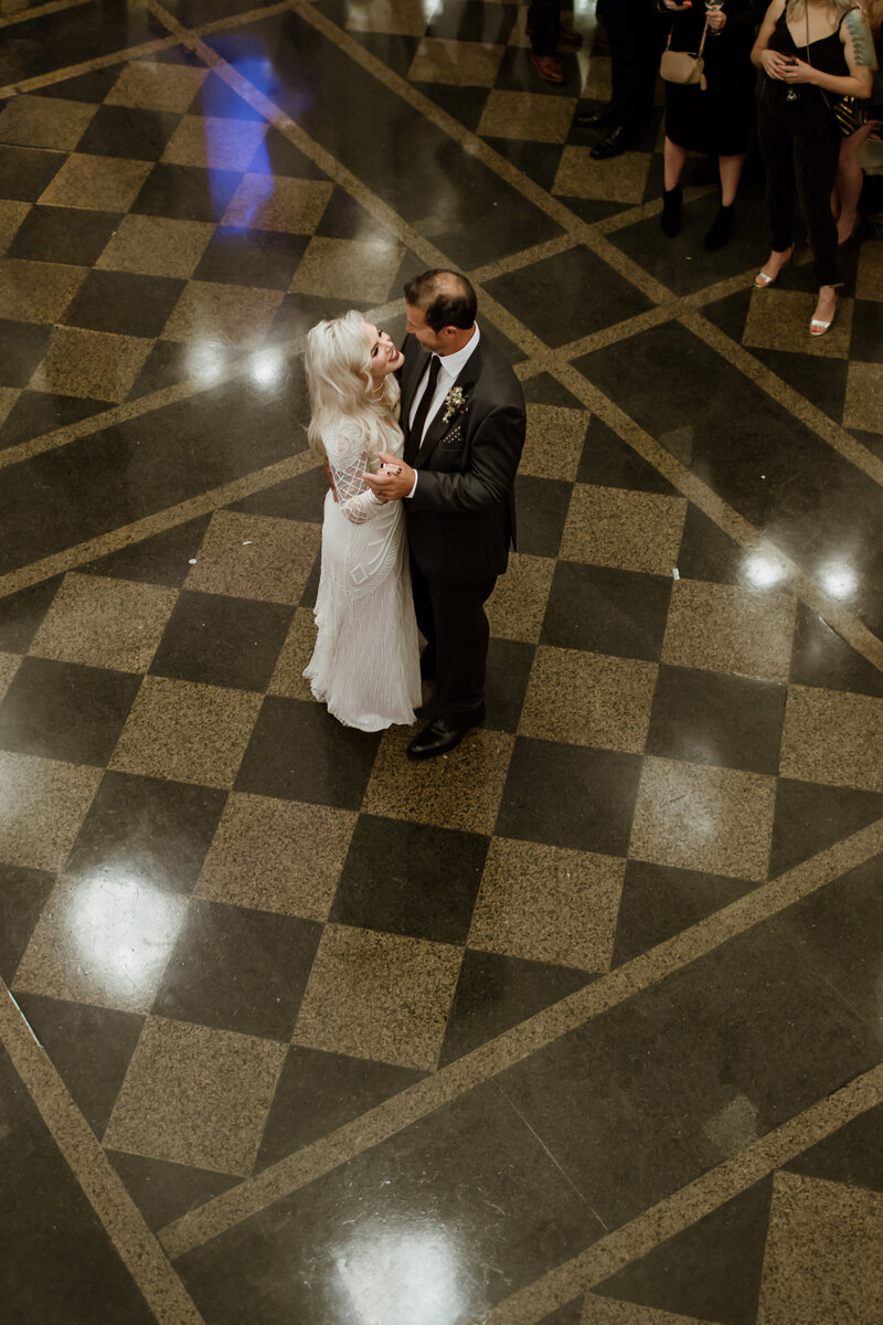 Fort Worth Wedding Photographer Megan Christine Studio captures an elegant ballroom first dance. 