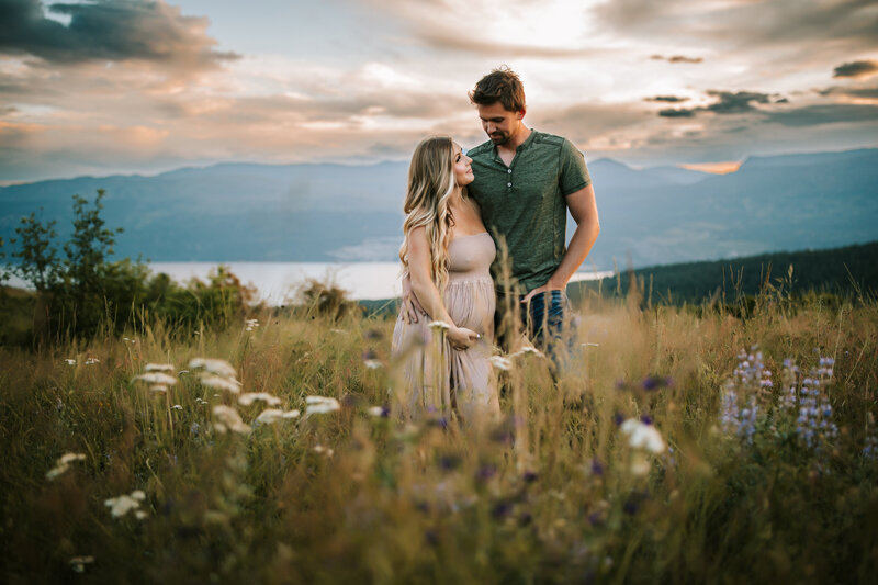 Pregnant couple posing outdoors for Ottawa Maternity Photography