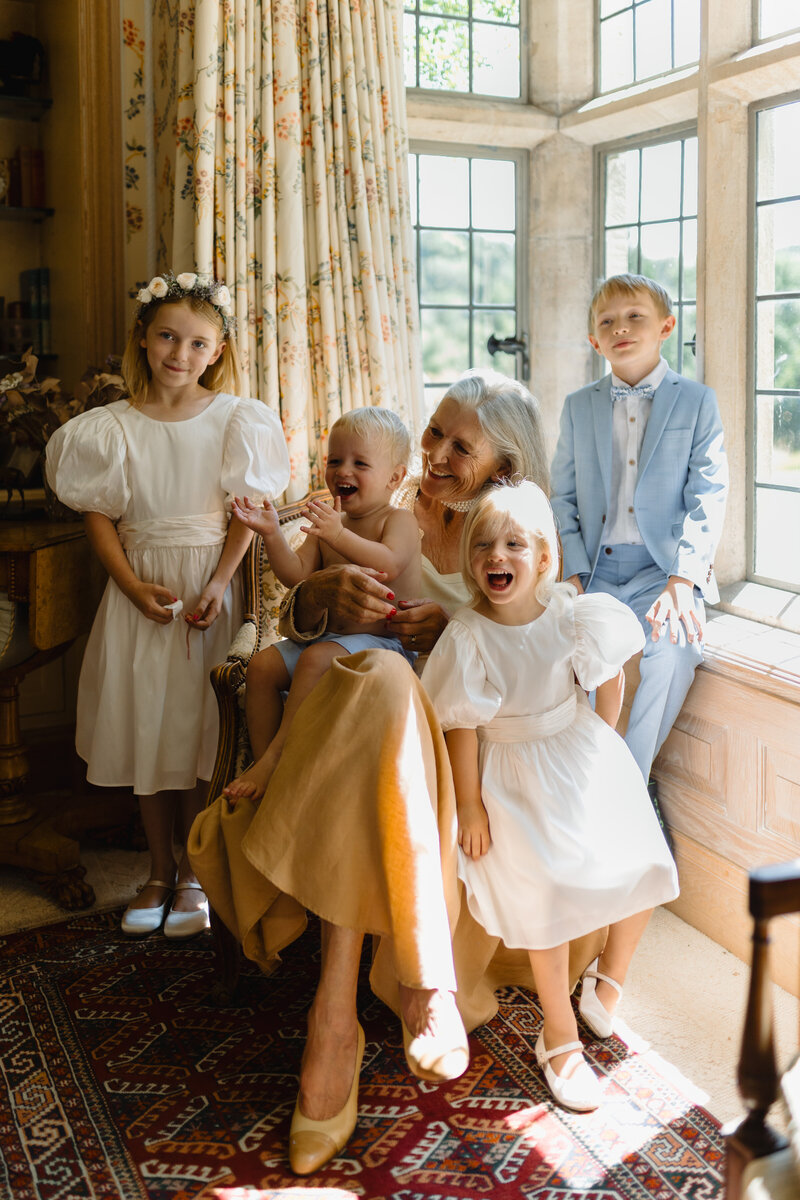 Family portrait at traditional english country wedding from international wedding photographers, The Falkenburgs