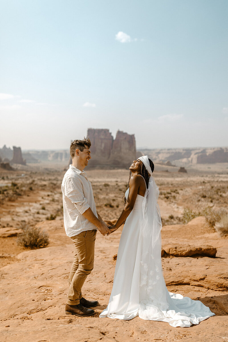 Couple shares private vows at Arches National Park.