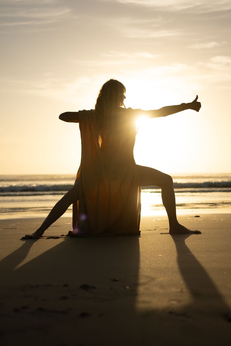 HarJiwan doing pose at sunset