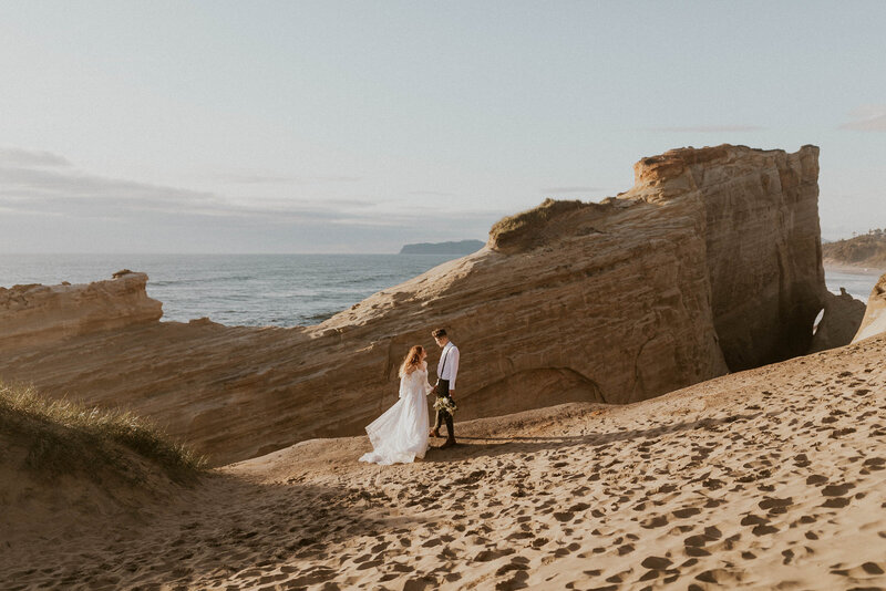 bride and groom near cliff