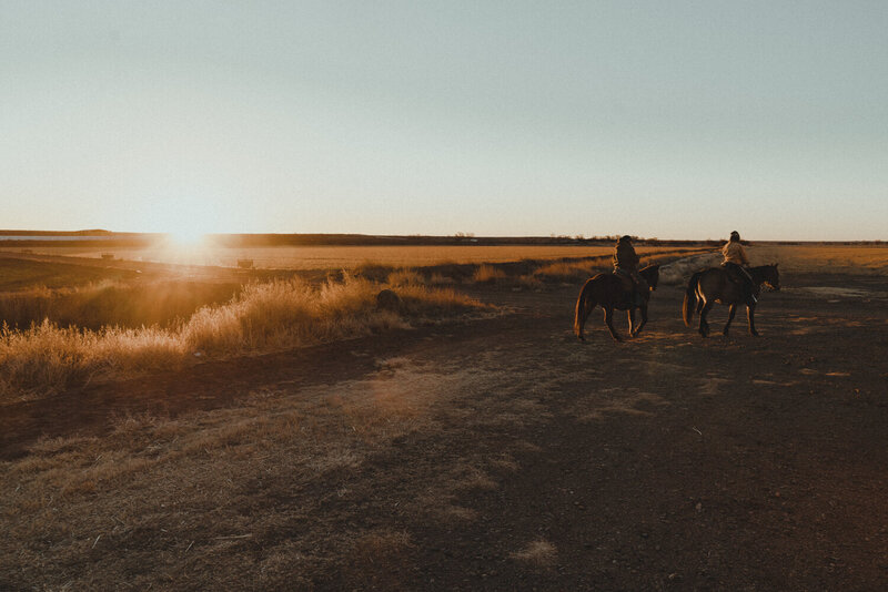 Two Cowboys Riding Horses Into The Sunset, From The Lore Of The Range Collection