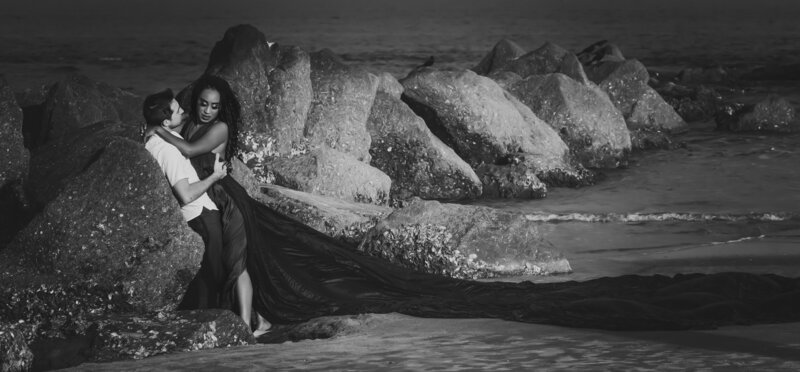 Savannah Georgia Boudoir and Glamour couple with woman in blue parachute gown on beach sexy and glamourous in black and white