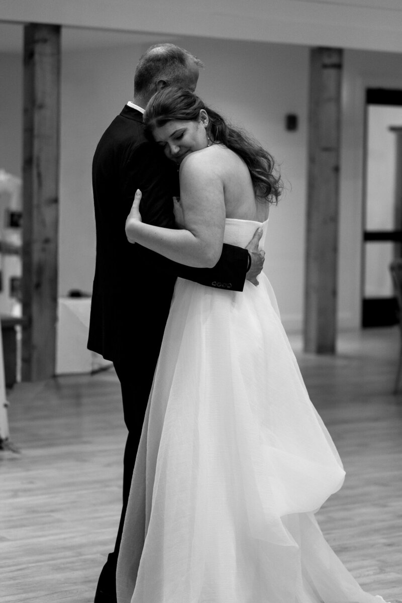 Vermont Wedding Photographer | Sincerely Liz Photography Documentary Wedding, Engagement, Elopement, Maternity and Newborn Photographer in New England | Bride and groom embracing while slow dancing at wedding reception