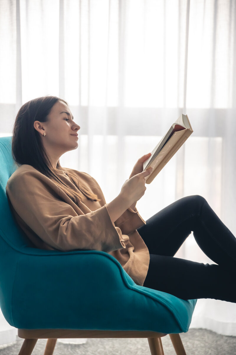 <a href="https://www.freepik.com/free-photo/young-woman-is-reading-book-while-sitting-armchair-by-window_36434774.htm#page=2&query=young%20woman%20is%20reading%20book%20while%20sitting%20armchair%20by%20window&position=19&from_view=search&track=ais&uuid=f8c280b6-5b81-49e3-a447-27d456092d30">Image by pvproductions</a> on Freepik