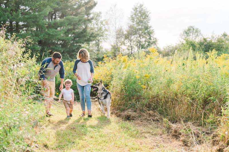 Family walking with dog