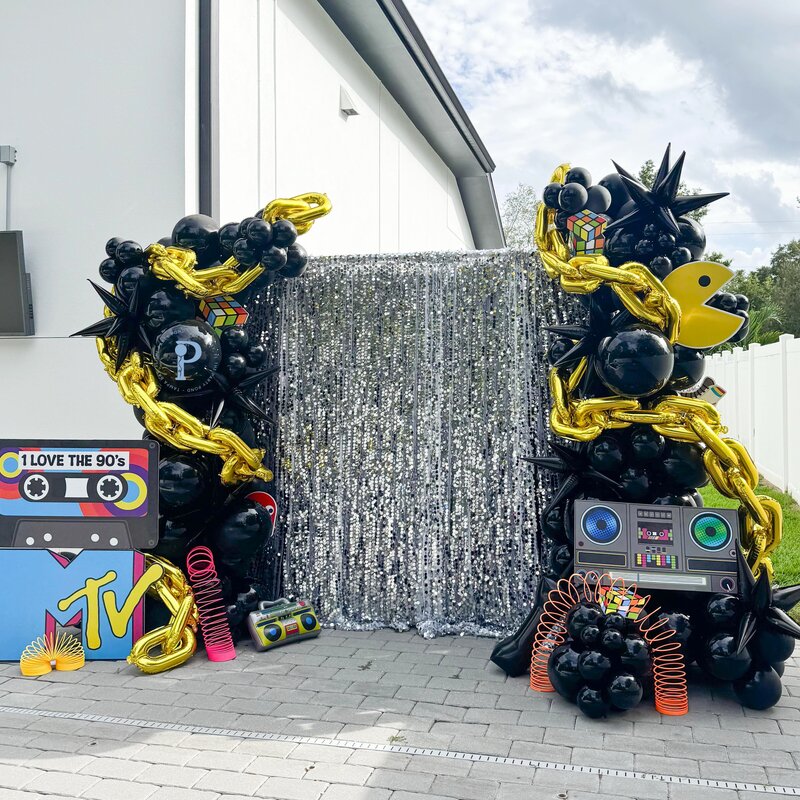 I love the 90s MTV party balloons and backdrop