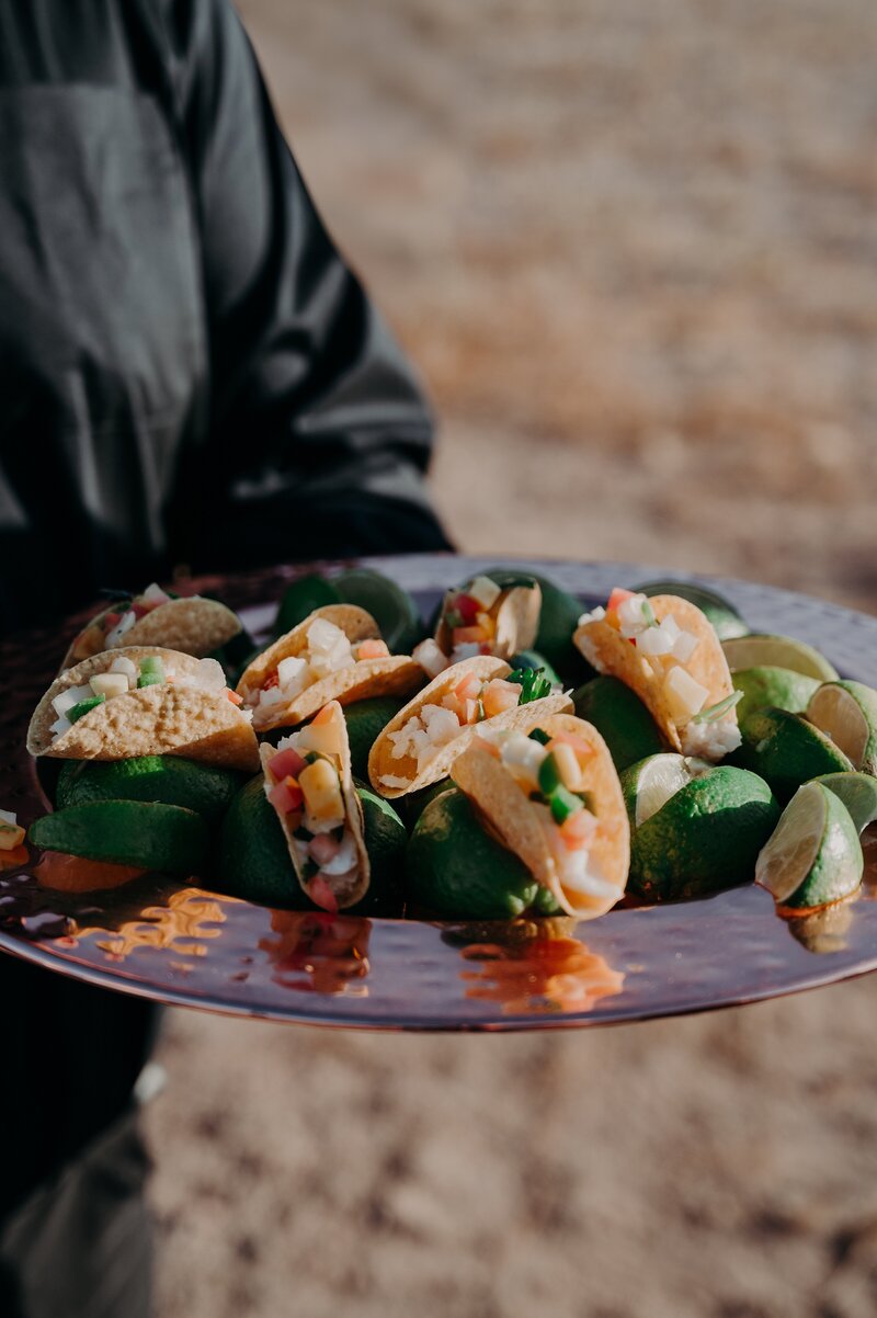 tray of taco appetizers at wedding cocktail hour