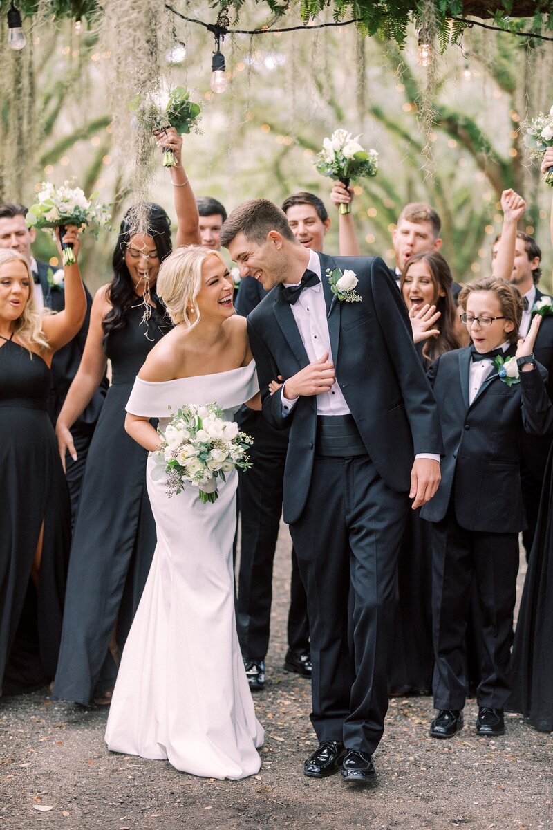 bride-groom-surrounded-by-wedding-party-charleston-278