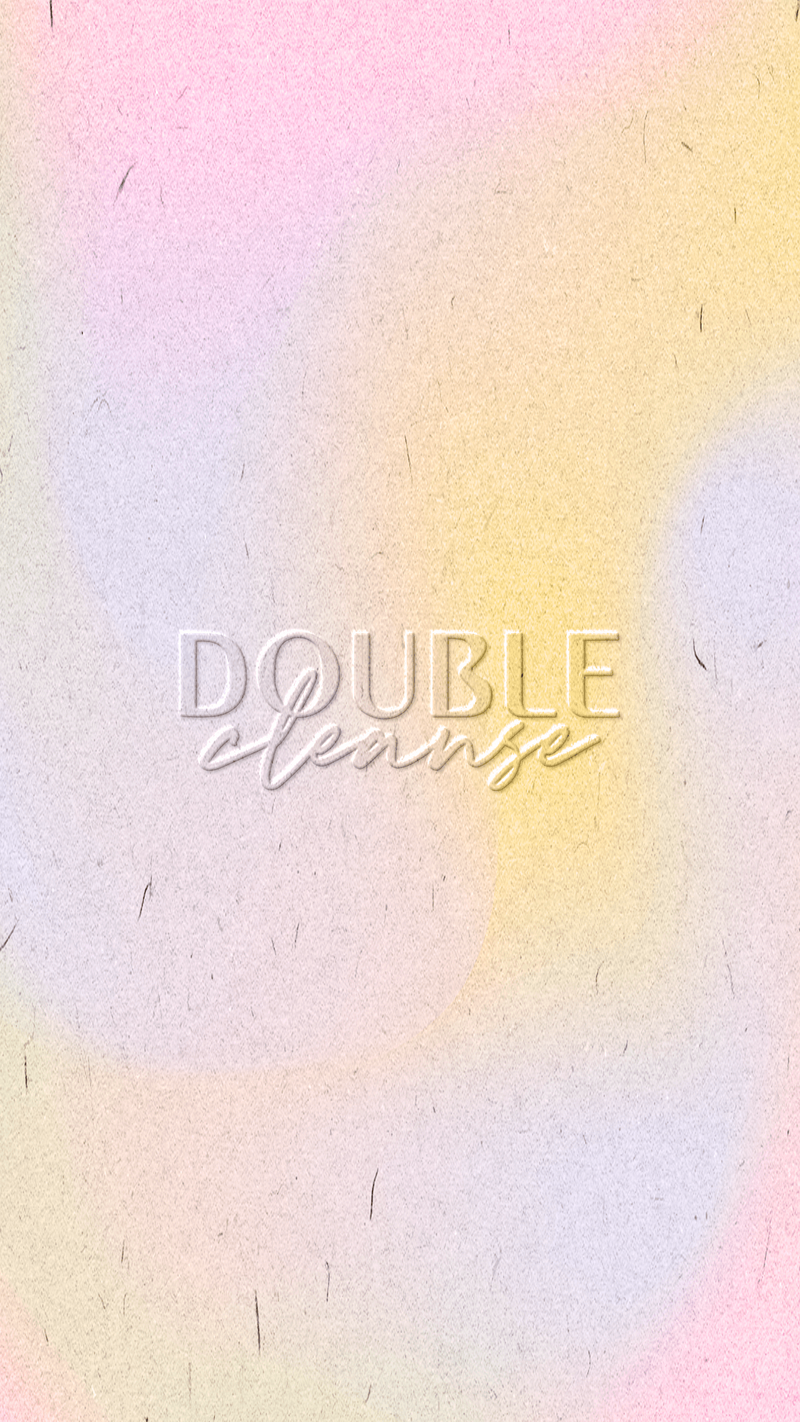 A soft, pastel gradient background featuring hues of pink, purple, yellow, and blue with the words "Double Cleanse" elegantly written in the center. The textured design gives the image a subtle, organic feel, enhancing the soothing and calming aesthetic associated with skincare and wellness.
