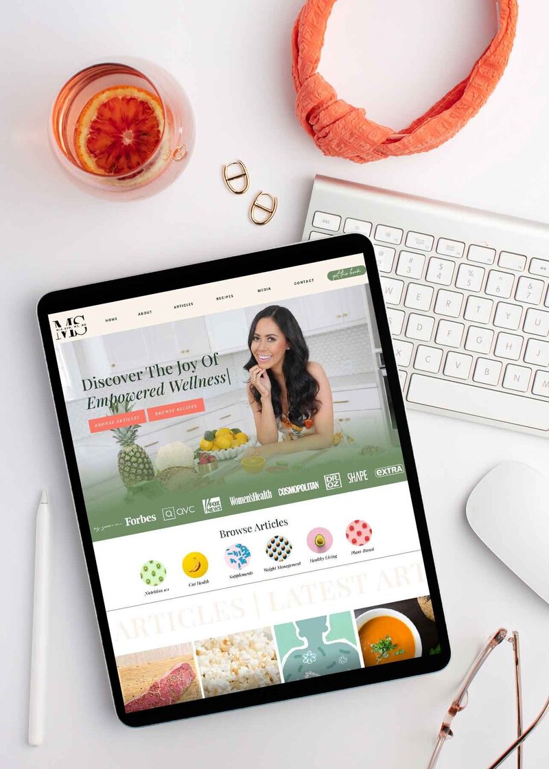 Embark on a journey of inspiration with Sucheta's world-renowned keynote speaker website on the captivating display of an iPad. Crafted with precision by a Showit Web Design specialist, immerse yourself in the transformative power of travel through seamless navigation and captivating visuals.
