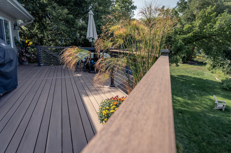 A deck using TimberTech Advanced PVC in multiple widths to create a pattern. 