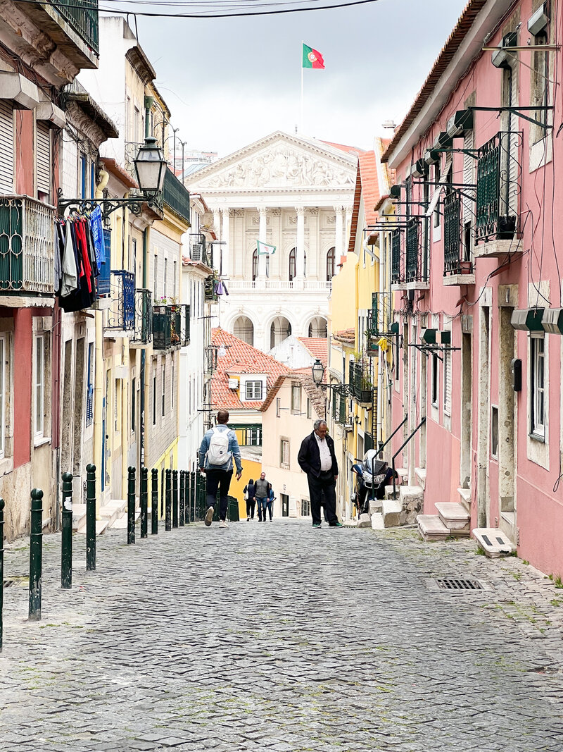 Barrio alto Lisbon street with portugal flag