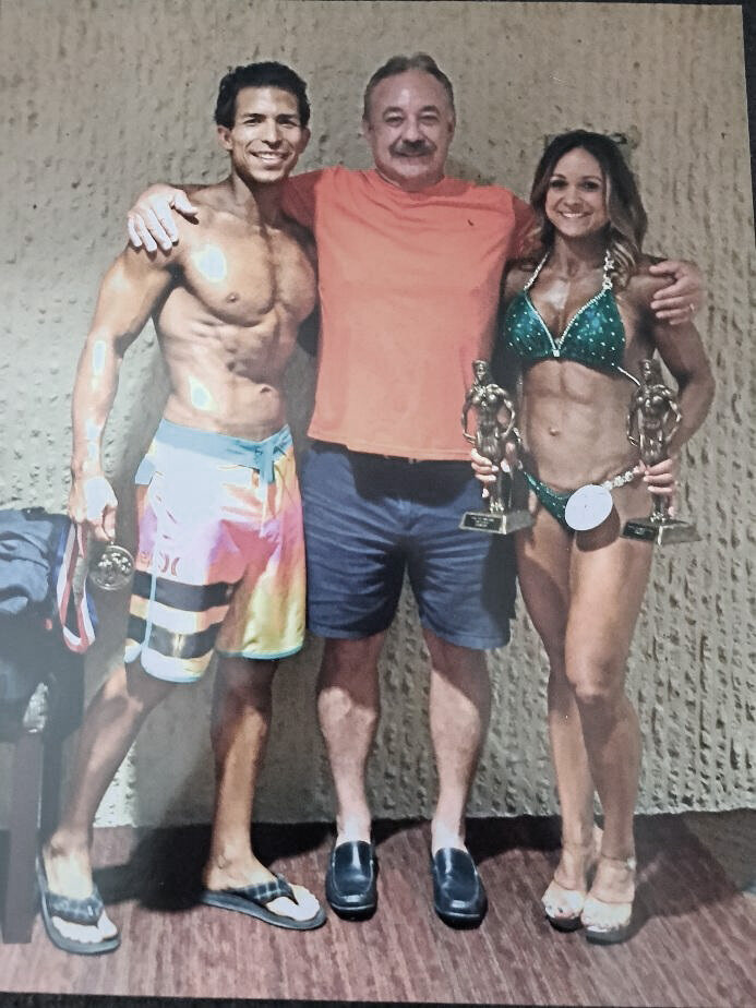 Certified strength coach, Doug Briggs with Brandon and Krystal at the NPC Contest