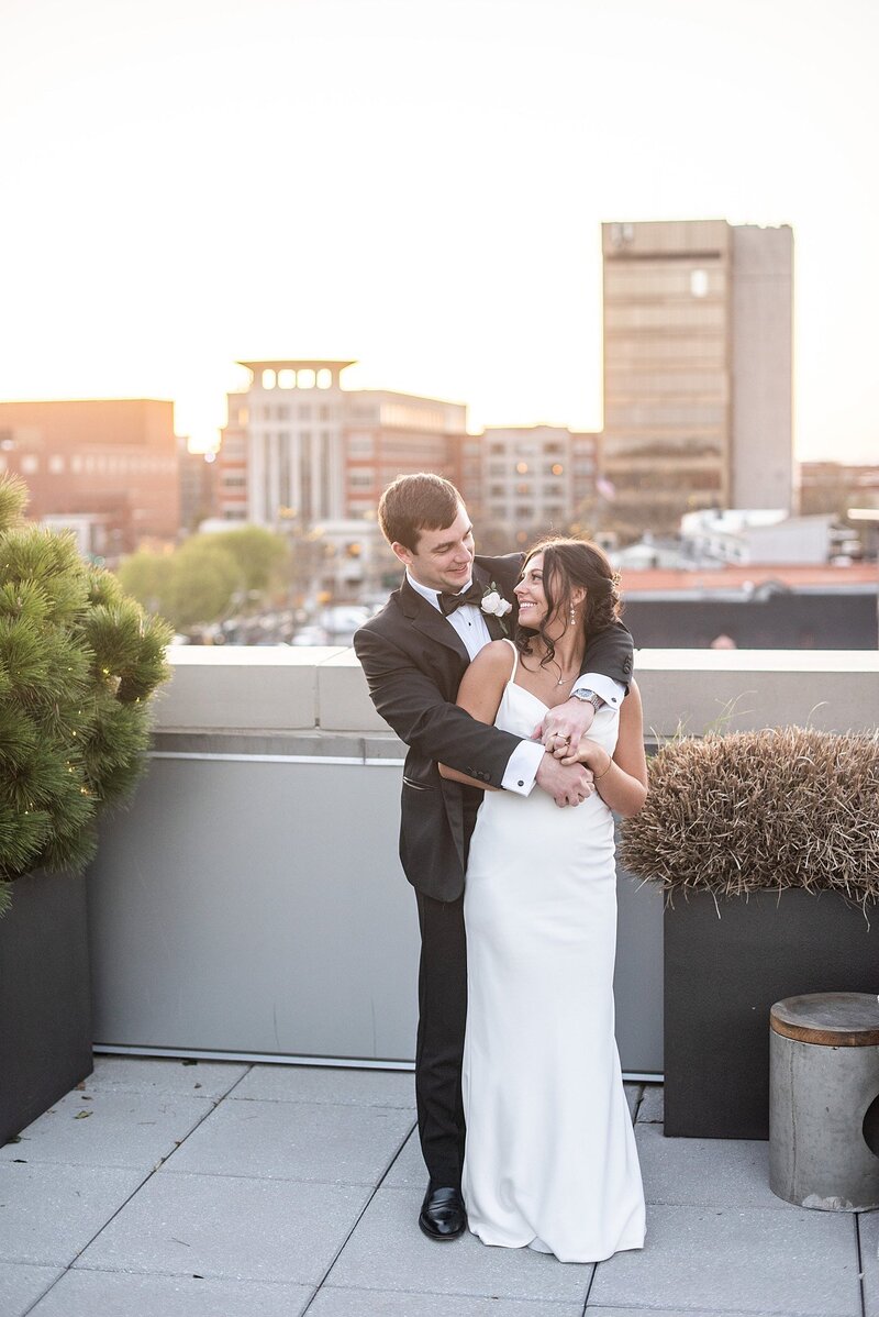 Bride and groom walk up memorial steps at their DC wedding