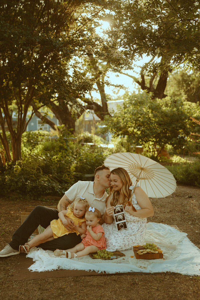 Dreamy styled shoot turned pregnancy announcement at Swenson House Garden in Abilene, TX