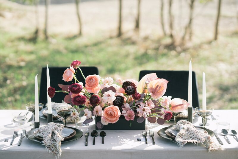 Stylish and modern florals at a reception celebrating Car Week at The Quail Lodge