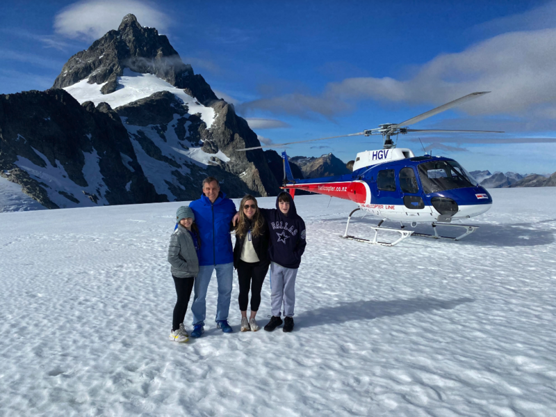 Family traveling in New Zealand  Glacier Landing  Milford Sound Helicopter Tour