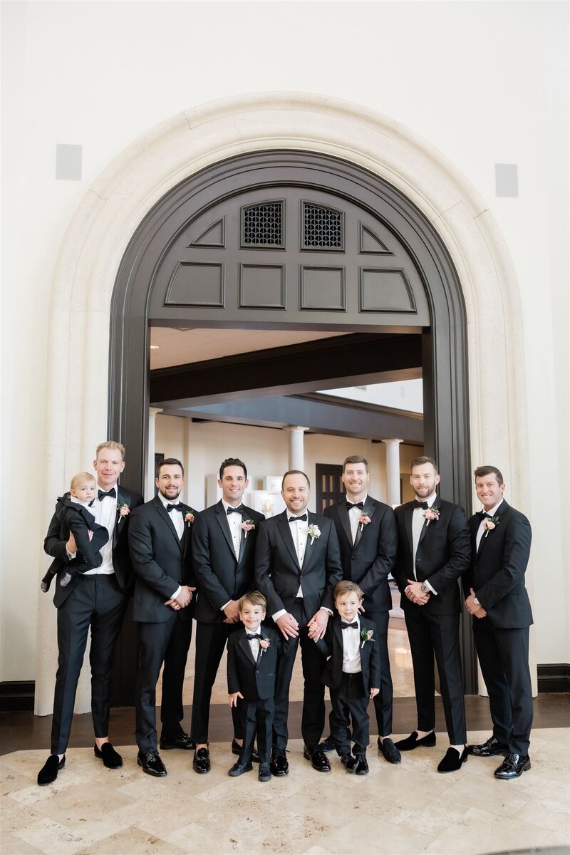 Groomsmen at the country club of orlando by Orlando wedding photographer