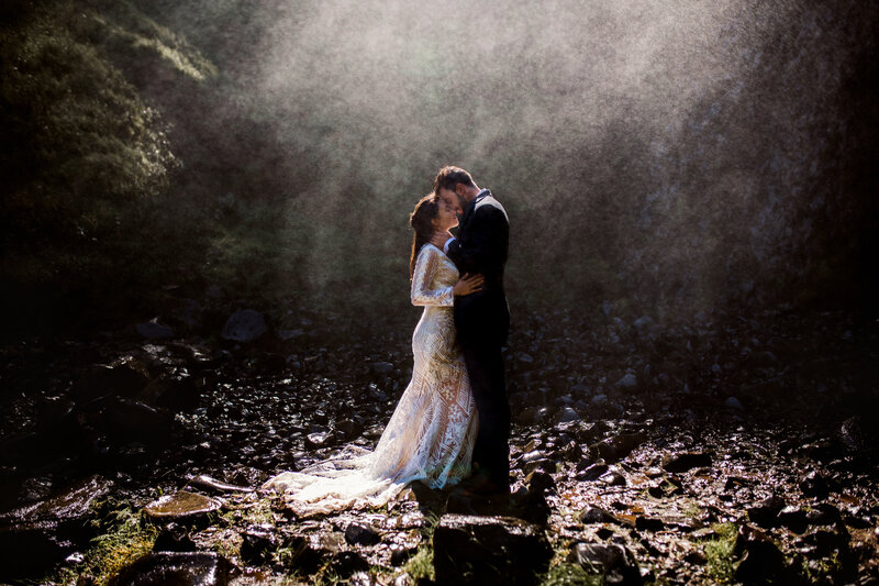 Bride standing in a mystical forest setting, perfect for an Oregon Coast elopement, photographed by an Oregon Coast Elopement and Wedding Photographer.