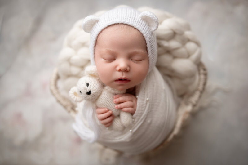 Capture precious memories of your newborn with Drea S Photo. We specialize in studio newborn photography sessions in Stamford CT, capturing those sweet early moments.