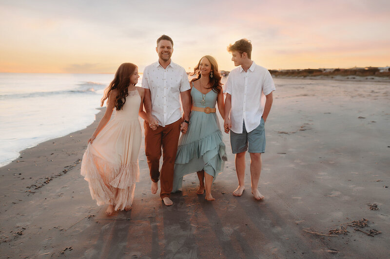 Family embraces for Family Photos in Asheville, NC.