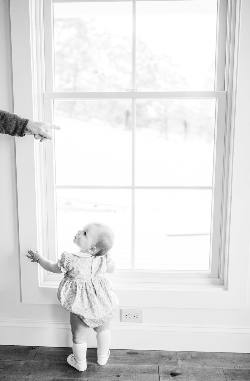 girl by window by knoxville wedding photographer, amanda may photos