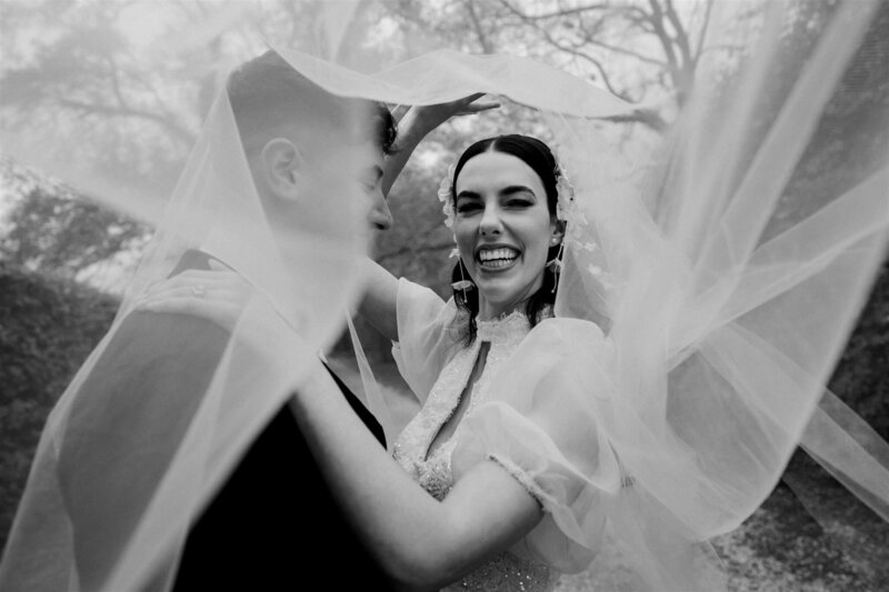 bride and groom hiding under the veil melbourne wedding kyneton