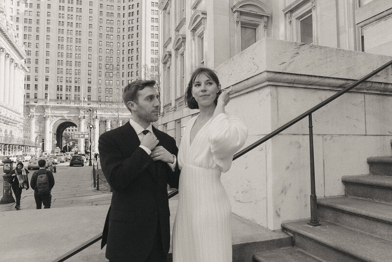 bride and groom outside of city hall after eloping shot by Elsie Goodman Photography | NYC Elopement Packages