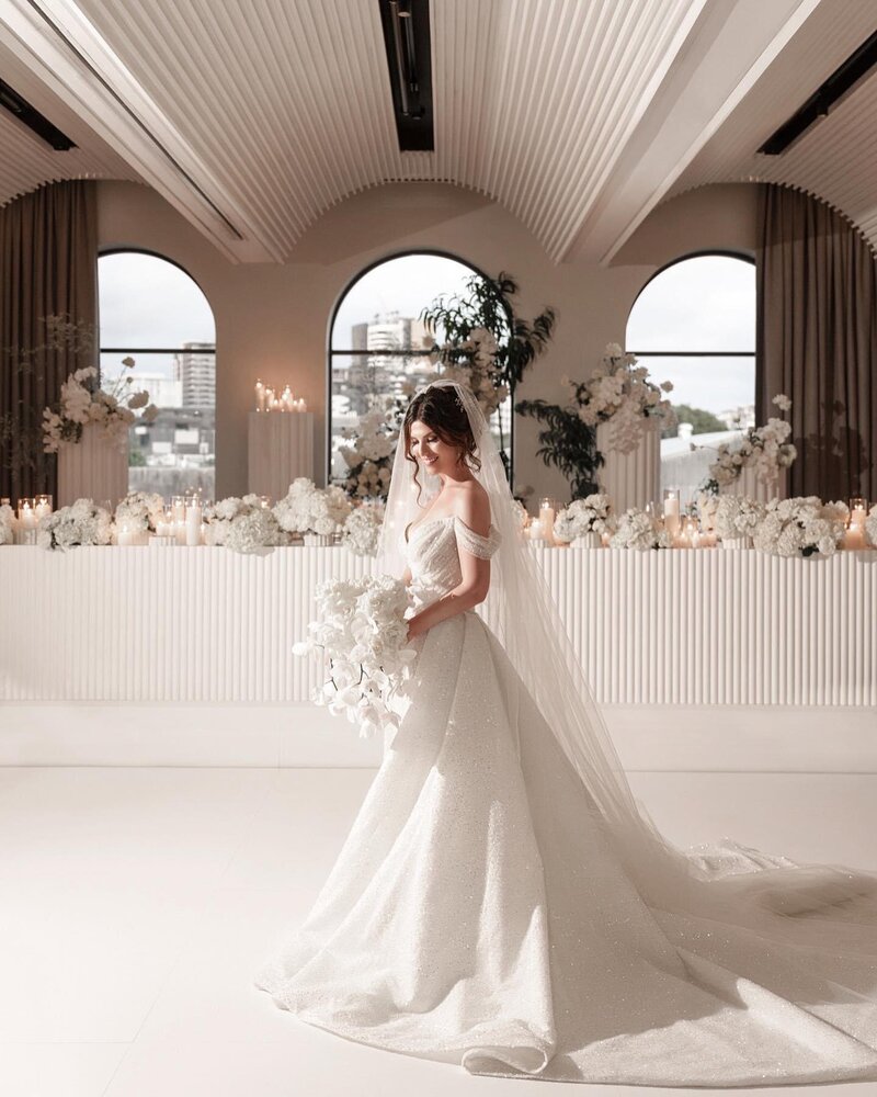 bride at the calile with an upstyle and soft makeup