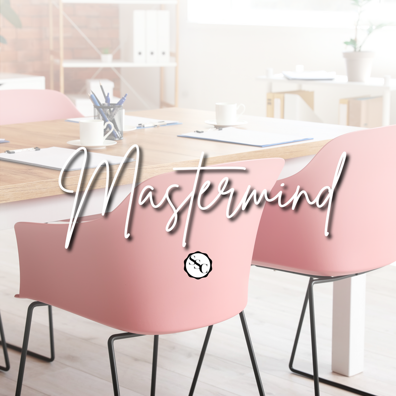 School for School Counselors Mastermind logo featuring an orange armchair in front of a white paneled wall