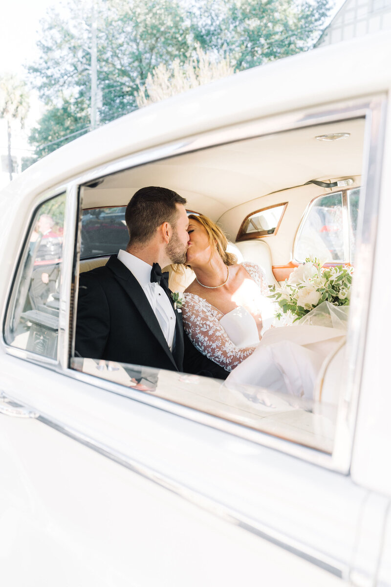 Bride and groom walk up memorial steps at their DC wedding