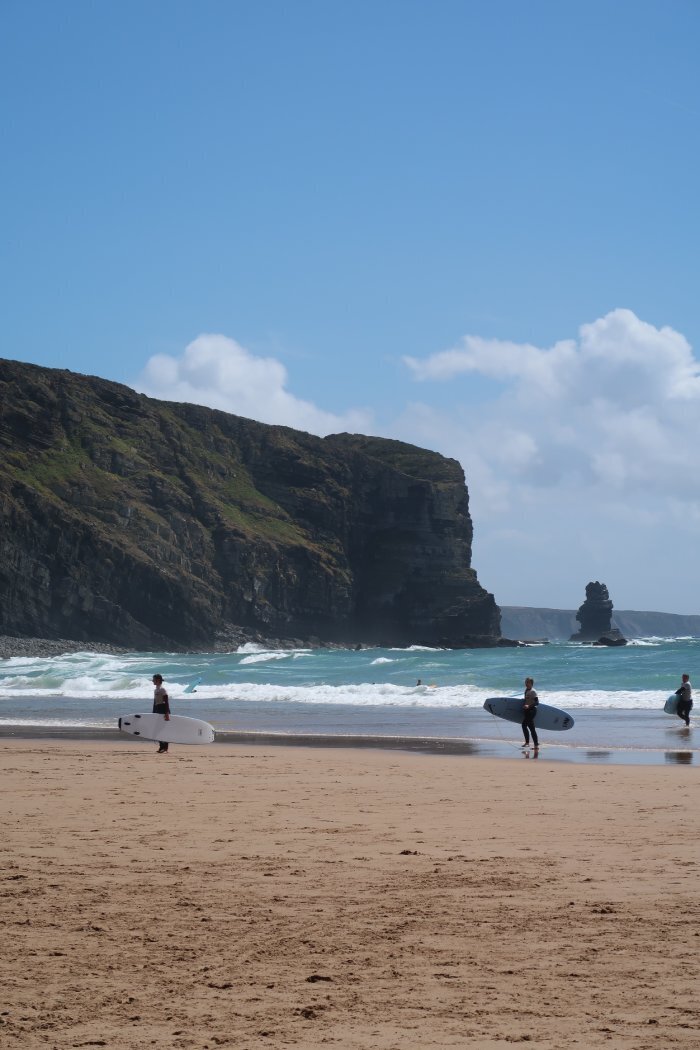 Surfers at Praia da Arrifana