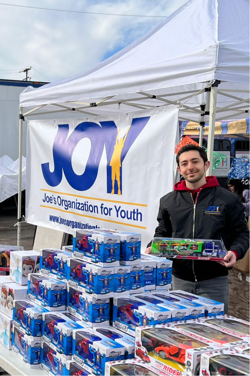 Founder Joe Kaprielan representing JOY Organization for Youth at volunteer booth