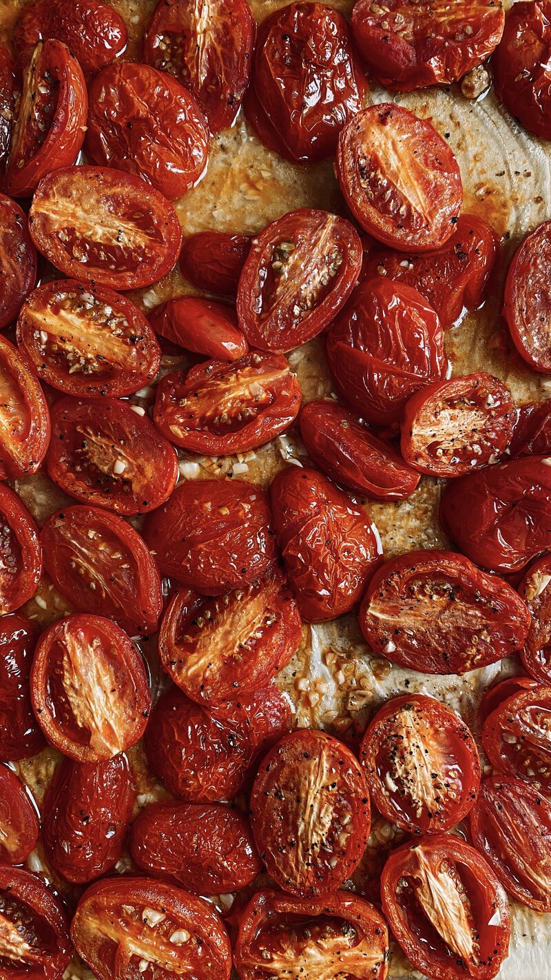 Roasted Roma tomatoes with pepper, salt, and chopped garlic.