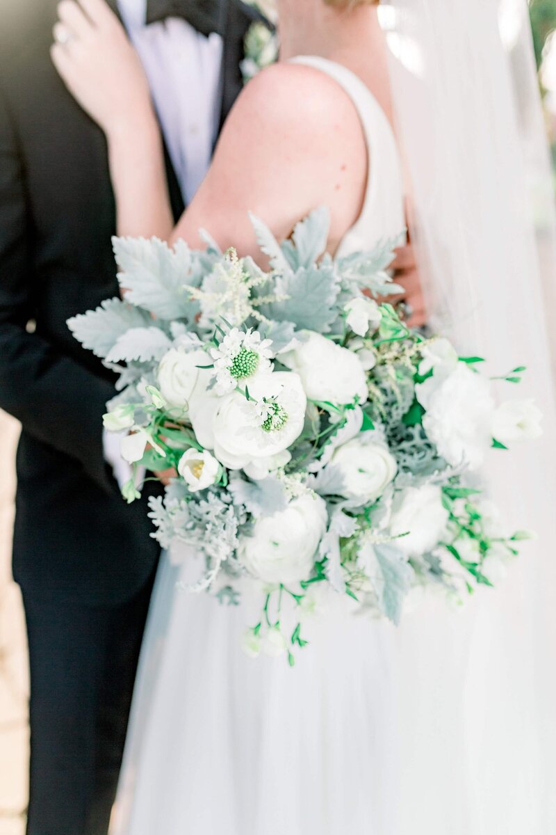 bride and groom with bridal bouquet