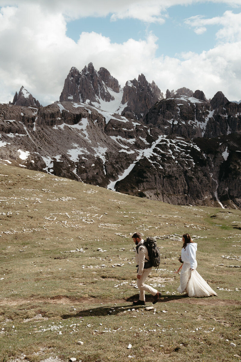 Couple hikes along the Cadini di Misurina trail for their Dolomites Elopement 