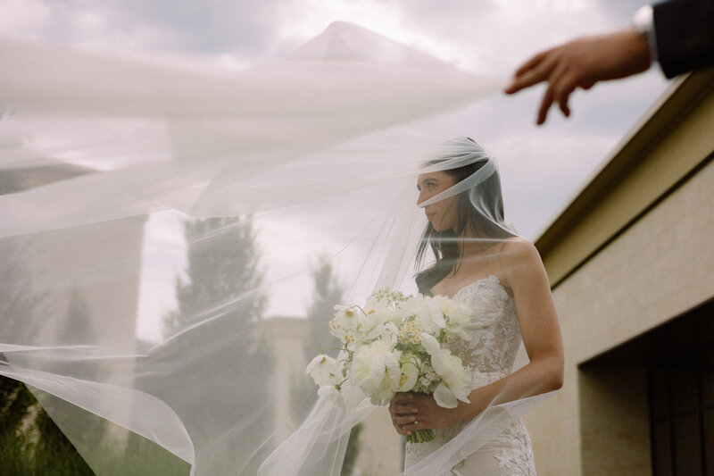 downtown kelowna rooftop elopement couple twirls