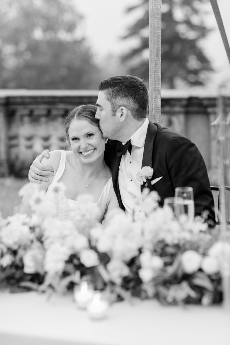 bride-groom-kiss-reception