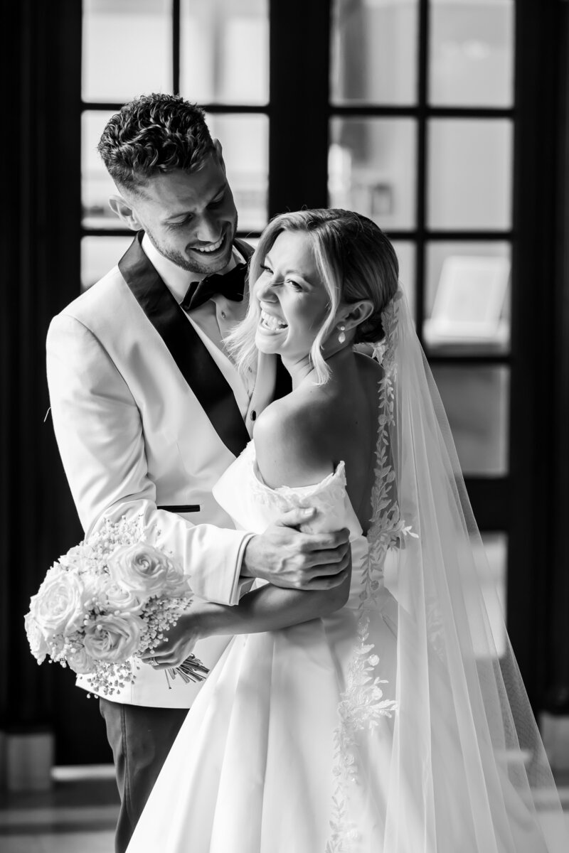 Bride and groom walk up memorial steps at their DC wedding
