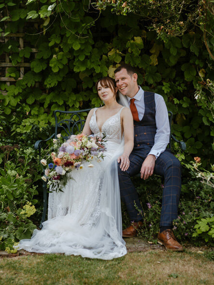 Romantic moment between married couple in the garden