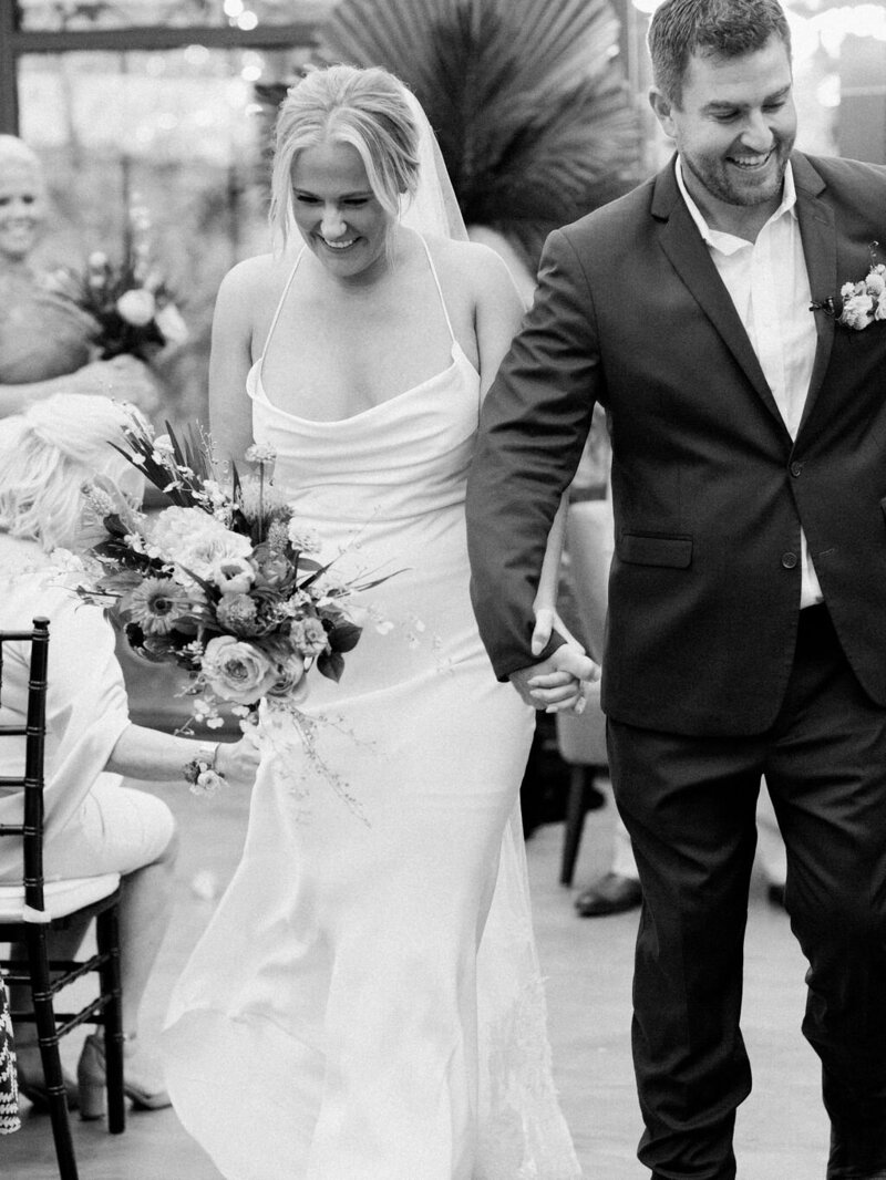 Bridal couple leaving their Galveston wedding ceremony.