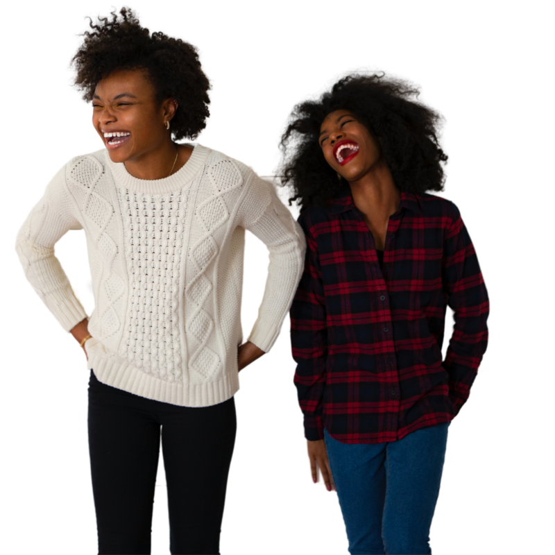 Two afro haired girls smiling